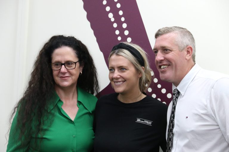 Three Annecto staff, including General Manager Carolynne Smith, posing for the camera in the Wendouree office.