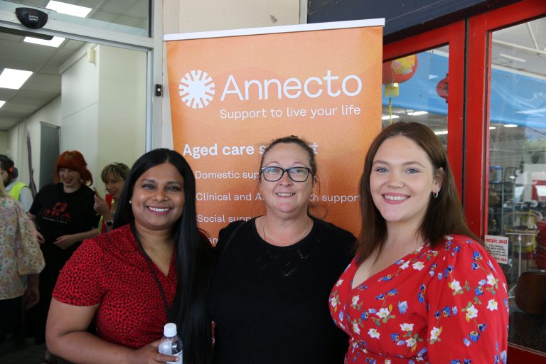 Three Annecto staff members during the opening day